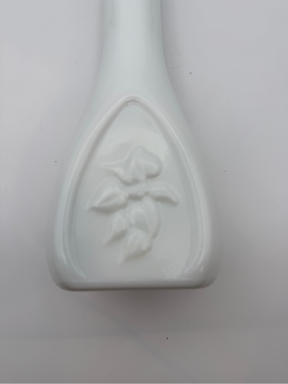 Vintage vase milk glass with embossed vines and scalloped rim